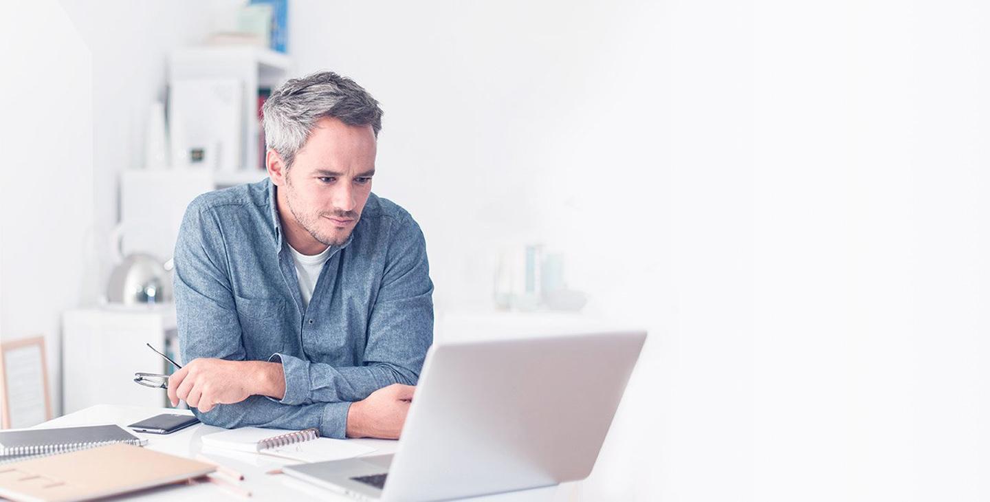 Man looking at laptop